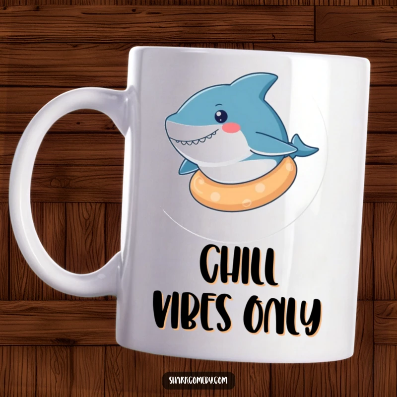 Funny kawaii shark mug featuring a cute shark floating relaxed on a colorful rubber ring, exuding ultimate peace and joy.