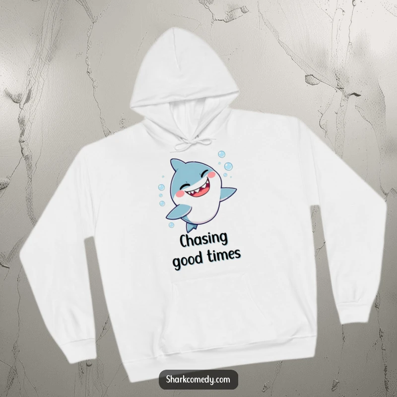 Funny hoodie illustration: a cute, kawaii shark giving a sly wink while playfully chasing bubbles, radiating mischievous charm.