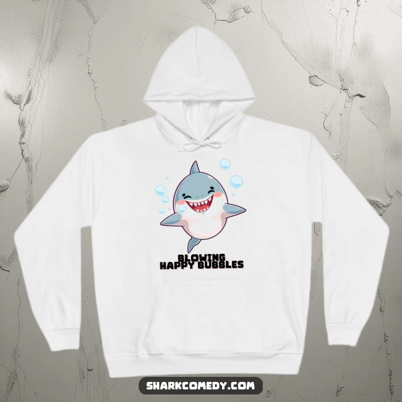 Funny Hoodie featuring a joyful shark blowing bubbles, offering warmth and ocean-themed fun.