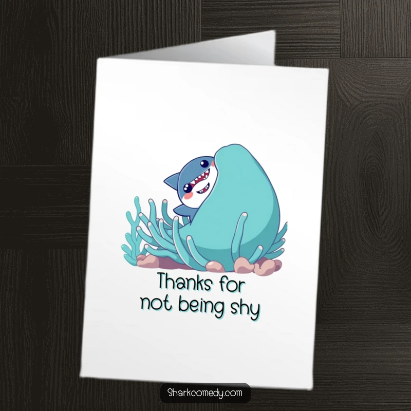 Funny Free Printable Thank You Card: Shy shark peeking from behind a sea anemone, expressing thanks with a shy, heartfelt smile.