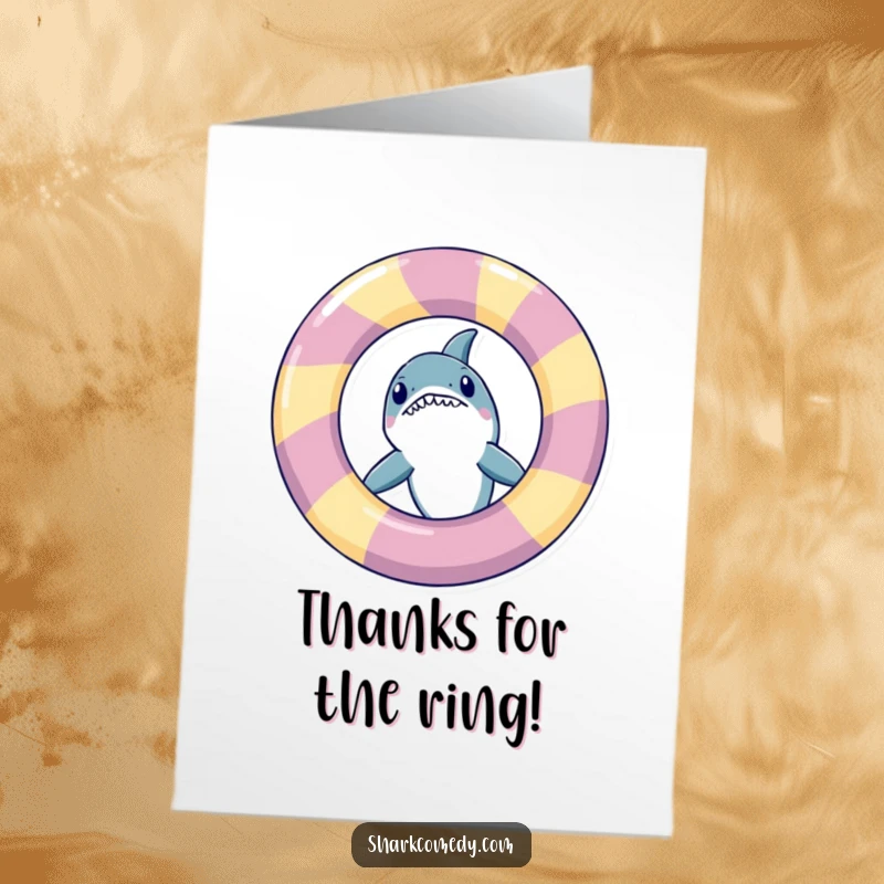 Funny Free Printable Thank You Card of a shark playfully peeking out from behind a large inflatable ring.