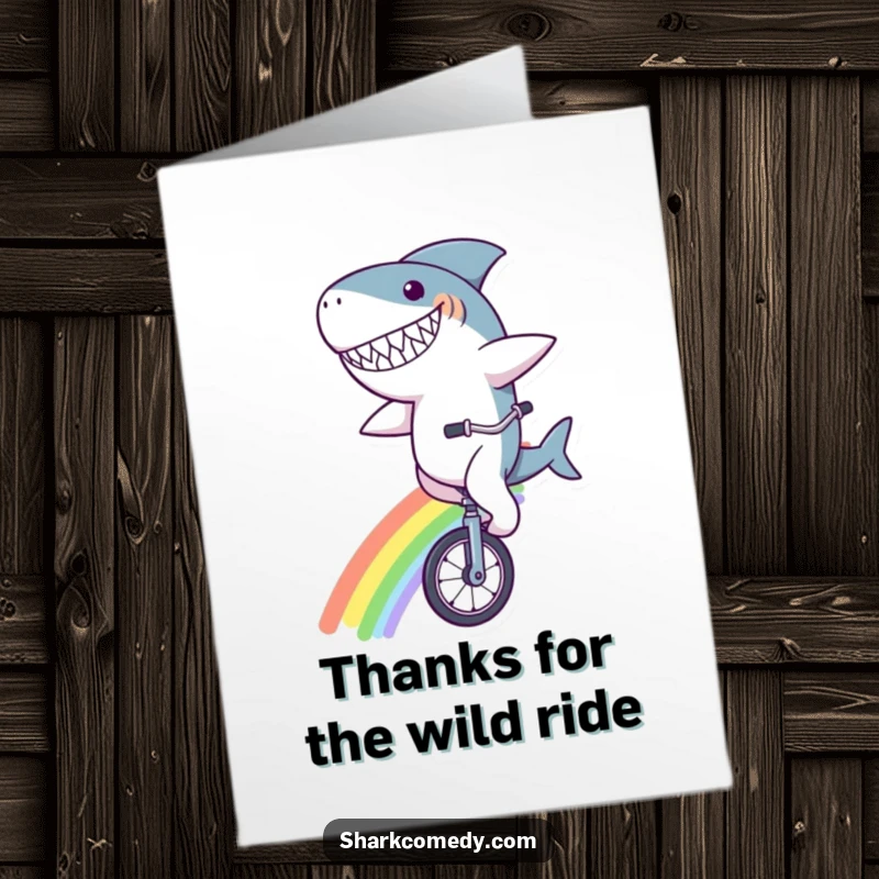 Funny Free Printable Thank You Card: A shark with a goofy grin riding a unicycle across a rainbow, a unique way to say thanks.