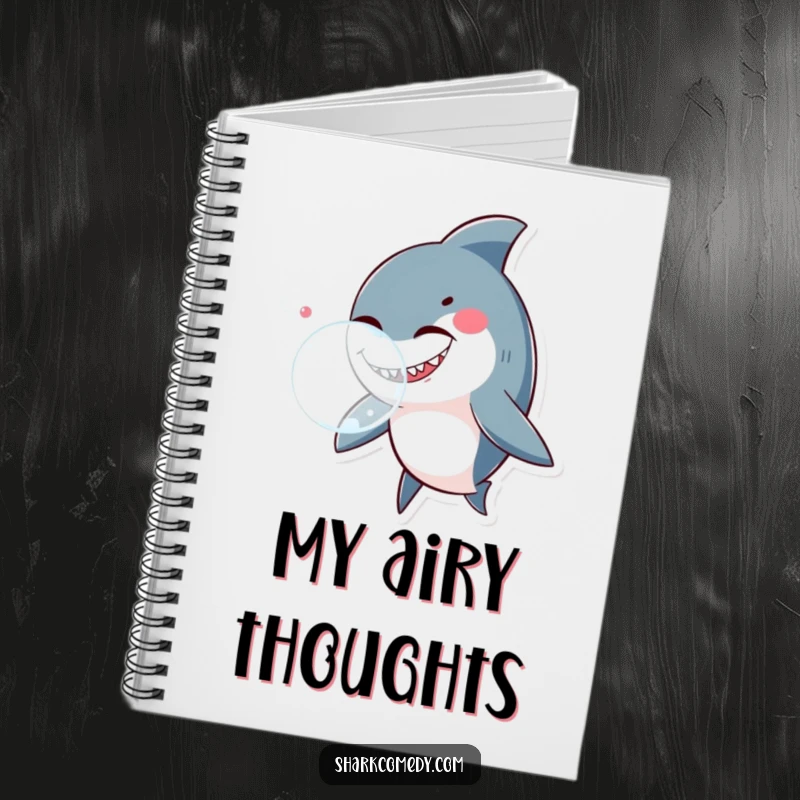 Funny shark winking and blowing a bubble, featured on a notebook cover, perfect for jotting down ideas whimsically.