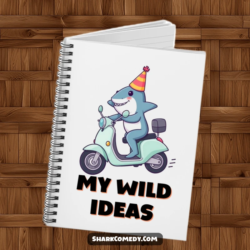 Funny shark notebook featuring a shark in a party hat zooming on a scooter, ideal for capturing fast-paced thoughts.