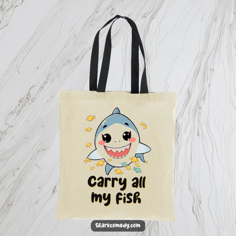Funny tote bag showcasing a kawaii shark with a big grin, juggling tiny fish, perfect for carrying items with a splash of humor.