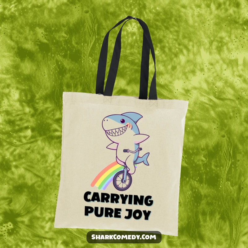 Funny shark character tote bag, grinning widely while riding a unicycle on a rainbow, a humorous and functional accessory for daily use.