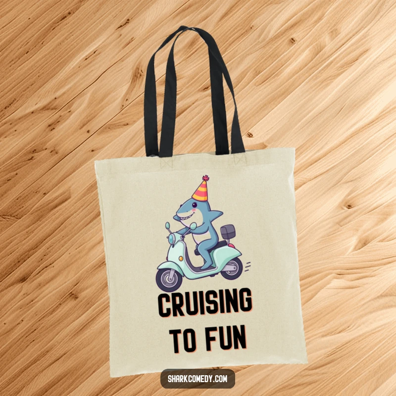 Funny shark tote bag with a shark in a party hat zooming on a scooter, embodying speed, fun, and celebration.